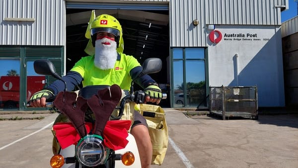 Postie with a Santa beard brings Christmas cheer to Murray Bridge