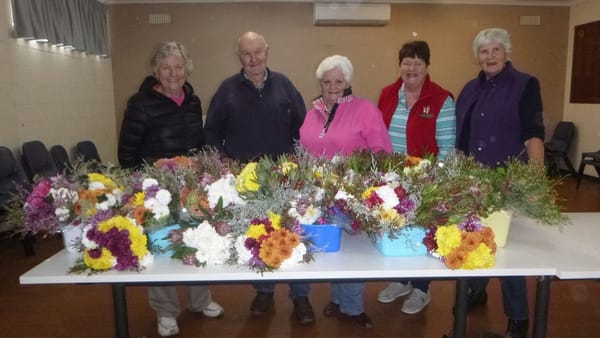 Thanks a bunch: Volunteers deliver Mothers Day flowers to Resthaven residents