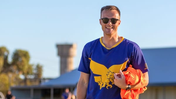 Junior footy coaches give back to their communities